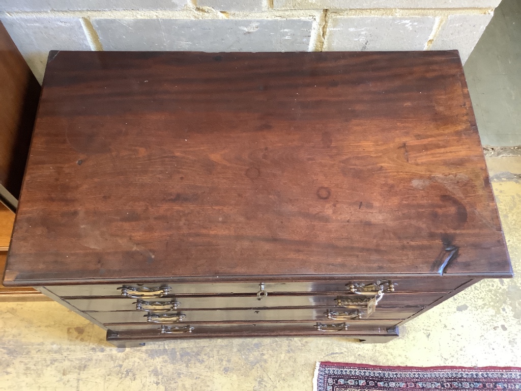 A George III mahogany chest fitted brushing slide, width 87cm, depth 49cm, height 82cm